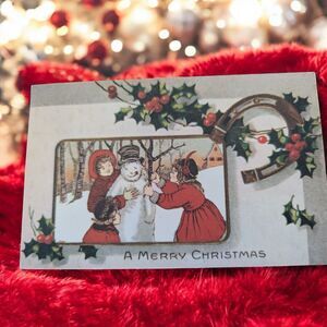 Postcard A Merry Christmas with Holly Horseshoe Children Art Print Snowman 1970